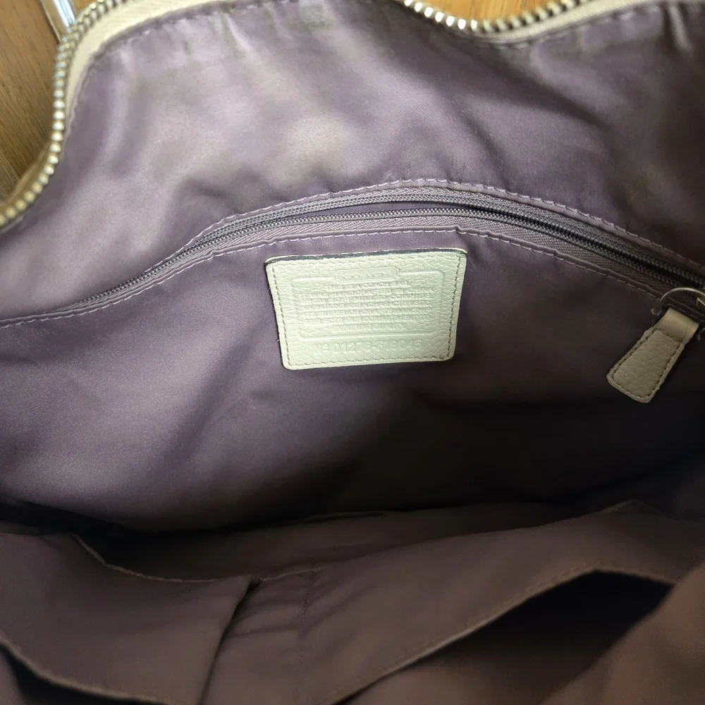 Coach moderately used